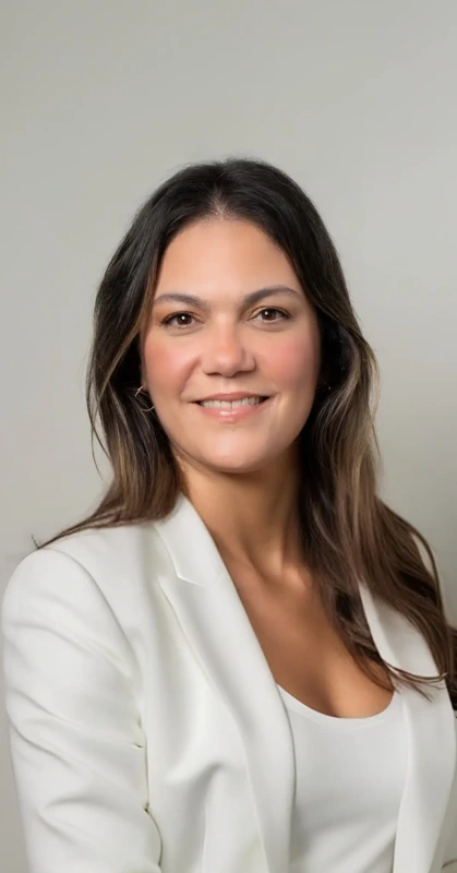 Raquel Núñez-Alicea wearing a white blazer